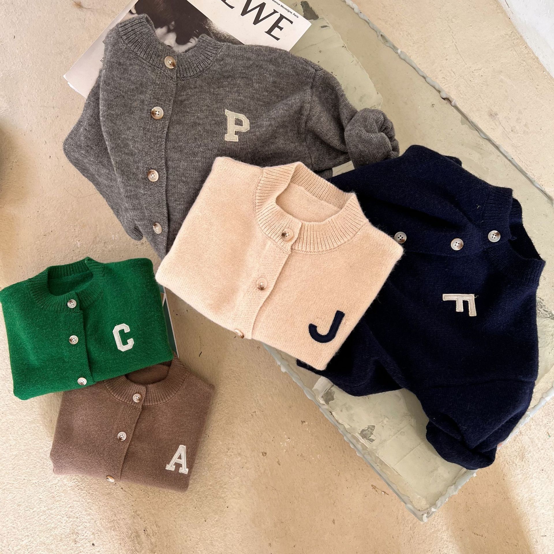 Picture of Trendy children's sweater 2023 spring new boys and girls round neck solid color letter wool cardigan baby casual coat