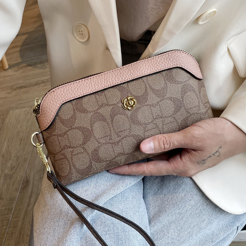 Picture of 2025 New Handbags Women's Small Bags Fashionable Shoulder Crossbody Bags Trendy Wallets Women's Long Mobile Phone Bags Mom's Style