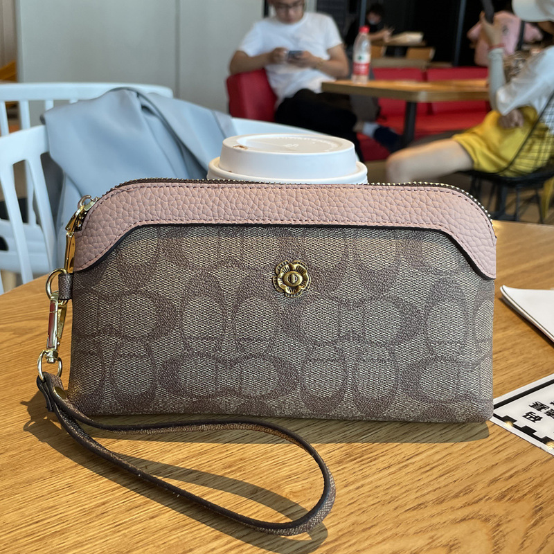 Picture of 2025 New Handbags Women's Small Bags Fashionable Shoulder Crossbody Bags Trendy Wallets Women's Long Mobile Phone Bags Mom's Style