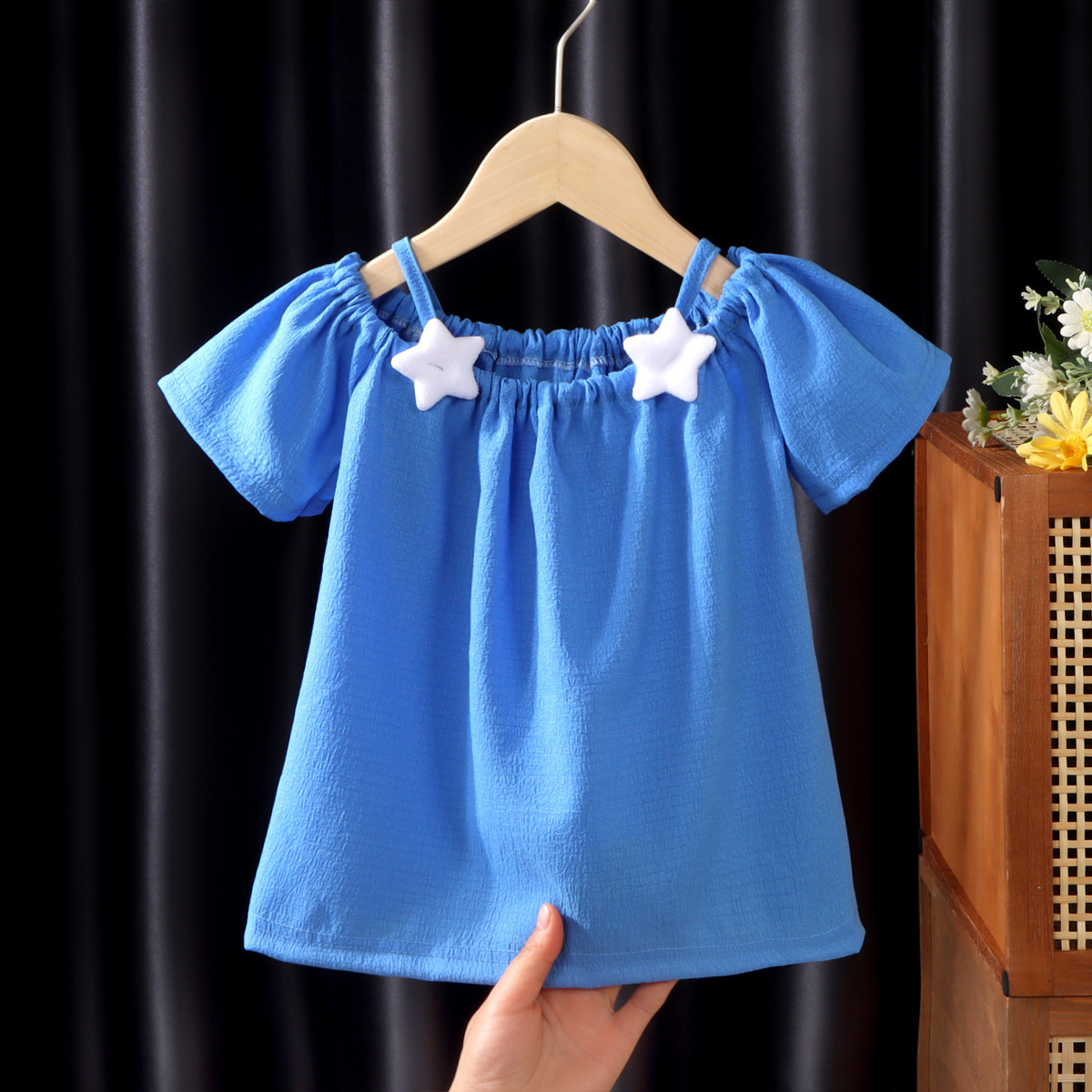 Picture of Girls' short-sleeved T-shirt 2024 new summer baby girls' off-shoulder strap fashionable western style top for infants and children