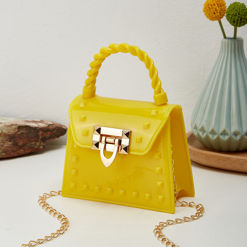 Picture of 2023 new fashion simple solid color rivet portable PVS mini jelly bag shoulder slung mouth red envelope wholesale