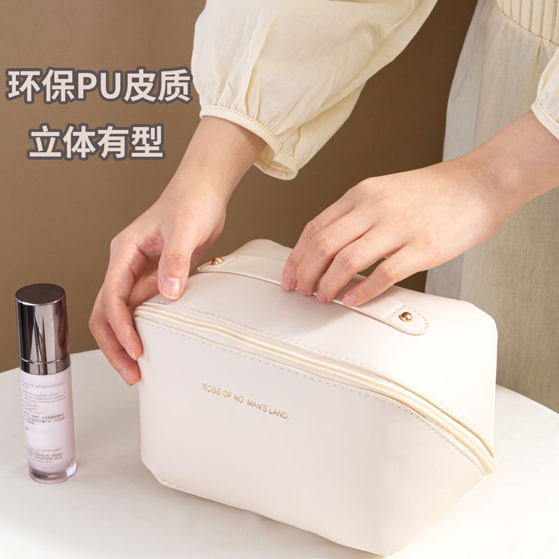 Picture of Ins Portable Large Capacity PU Portable Toiletry Bag Travel Partition Storage Bag Organ Pillow Cosmetic Bag Wholesale