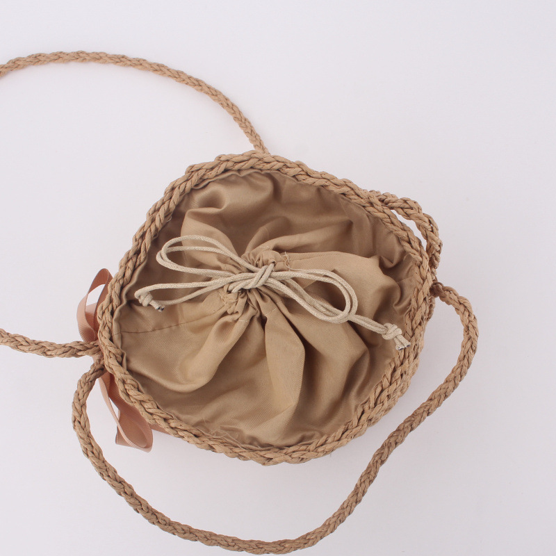 Picture of Dropshipping Simple Pure Color Straw Bag Forest Style One-Shoulder Hand-Carrying Cross-Body Bucket Woven Bag Cylindrical Beach Bag for Women