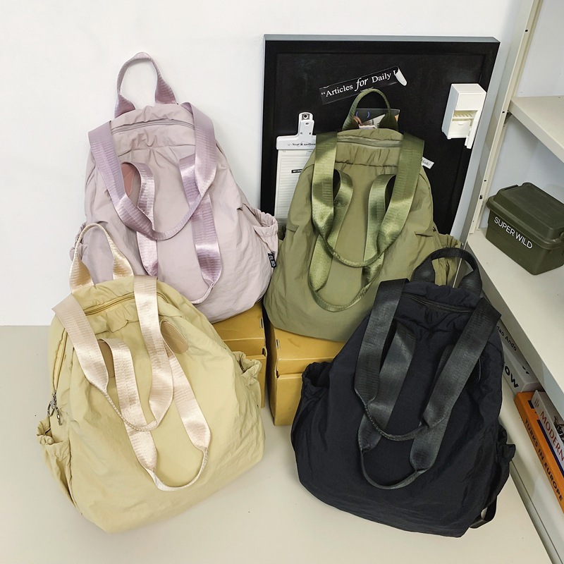 Picture of Casual Backpack 2024 New Men's and Women's Couple's Nylon Handbag Simple Lightweight Fashion Niche Backpack