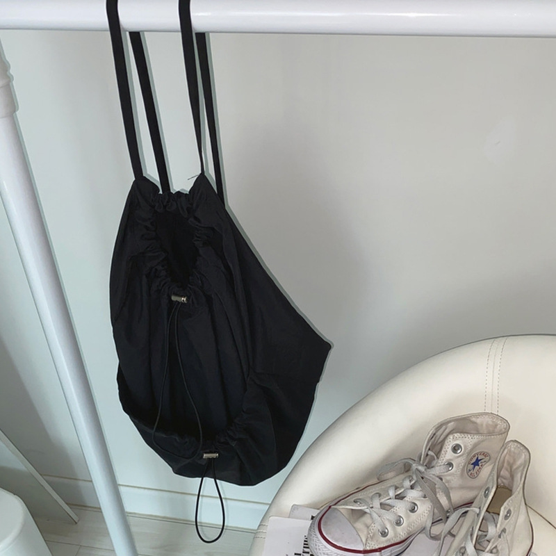 Picture of South Korea casual nylon large capacity student backpack simple Joker drawstring solid color canvas backpack wholesale