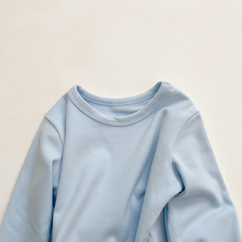 Picture of 2023 Children's Cotton Long-sleeved T-shirt Base Shirt Spring and Autumn Loose Solid Color Round Neck Sanding Top for Boys and Girls