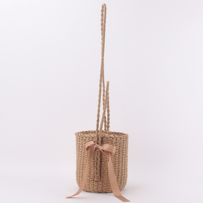 Picture of Dropshipping Simple Pure Color Straw Bag Forest Style One-Shoulder Hand-Carrying Cross-Body Bucket Woven Bag Cylindrical Beach Bag for Women