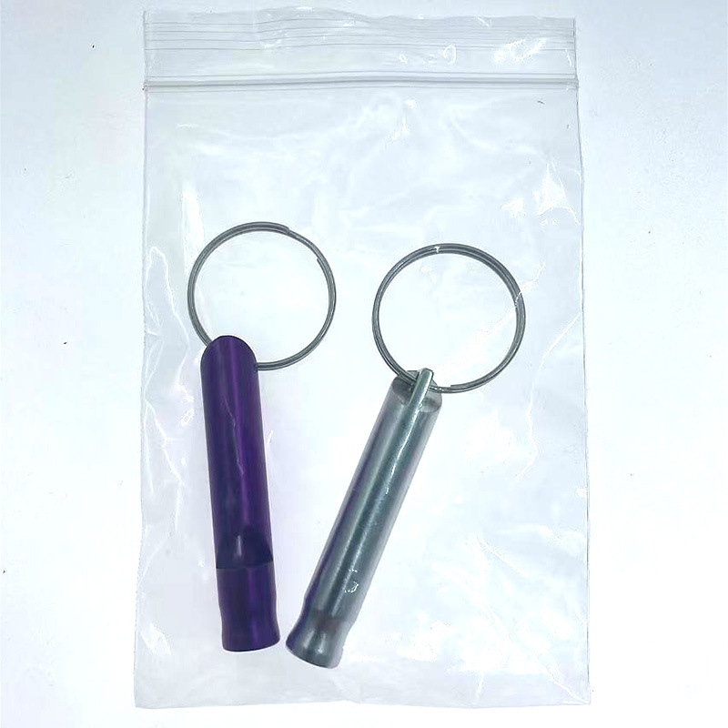 Picture of Outdoor aluminum alloy survival whistle wholesale portable key chain referee whistle high frequency emergency fire training survival whistle