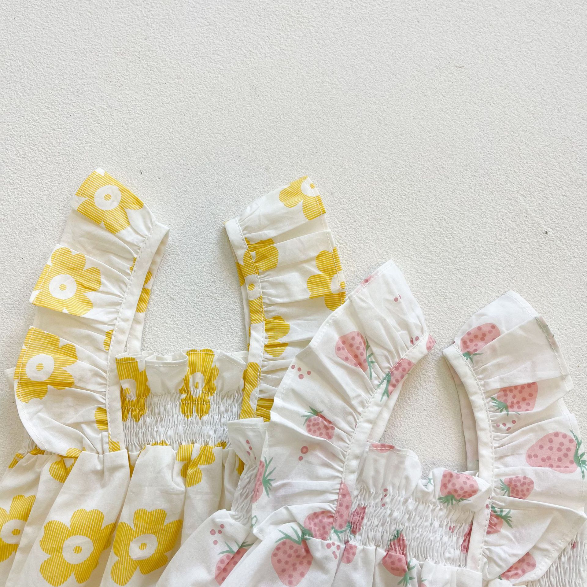 Picture of Ins2025 Baby Girl Summer Baby Jumpsuit Small Fresh Sling Bag Fart Clothing Outing Triangle Crawl Suit