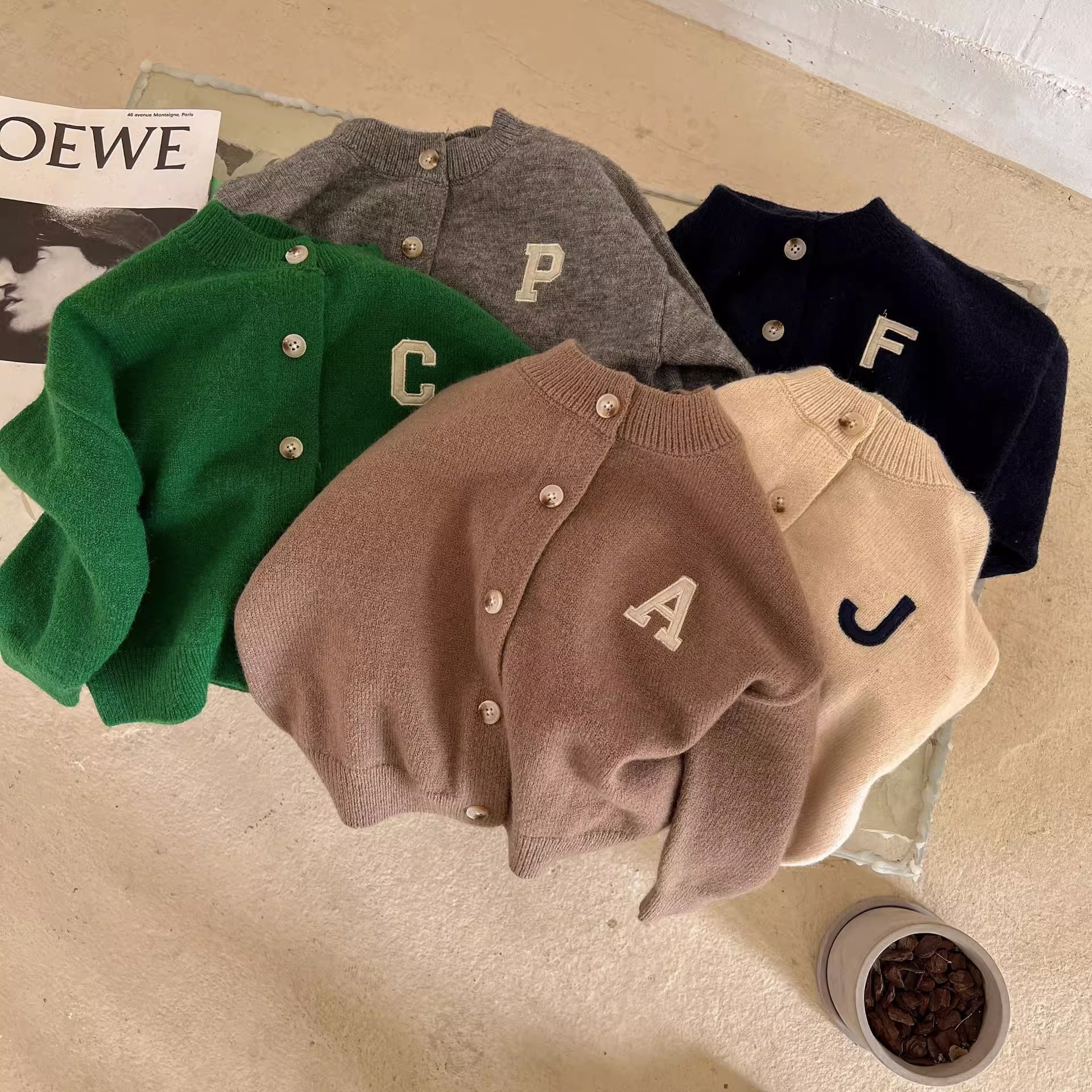 Picture of Trendy children's sweater 2023 spring new boys and girls round neck solid color letter wool cardigan baby casual coat