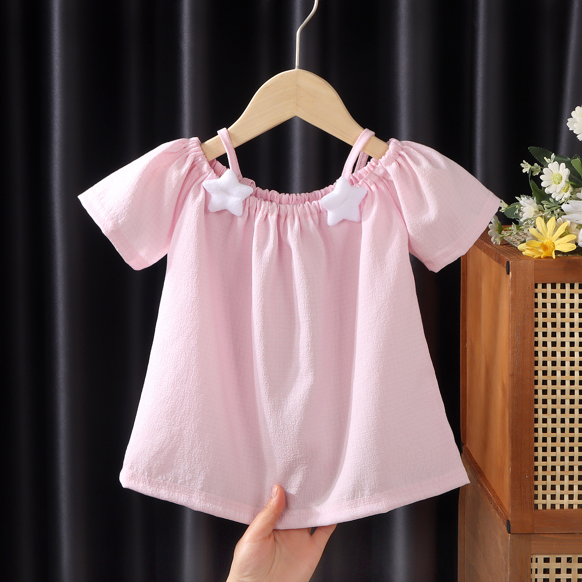Picture of Girls' short-sleeved T-shirt 2024 new summer baby girls' off-shoulder strap fashionable western style top for infants and children
