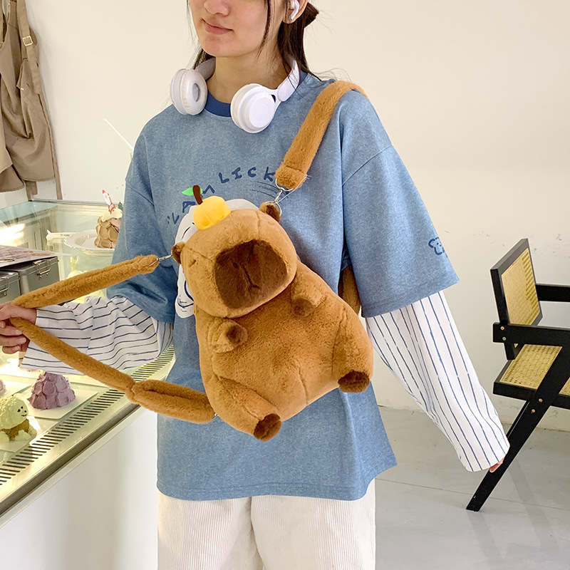 Picture of Cute cartoon otter plush contrast color children's backpack 25 new exquisite travel doll bag cross-border wholesale