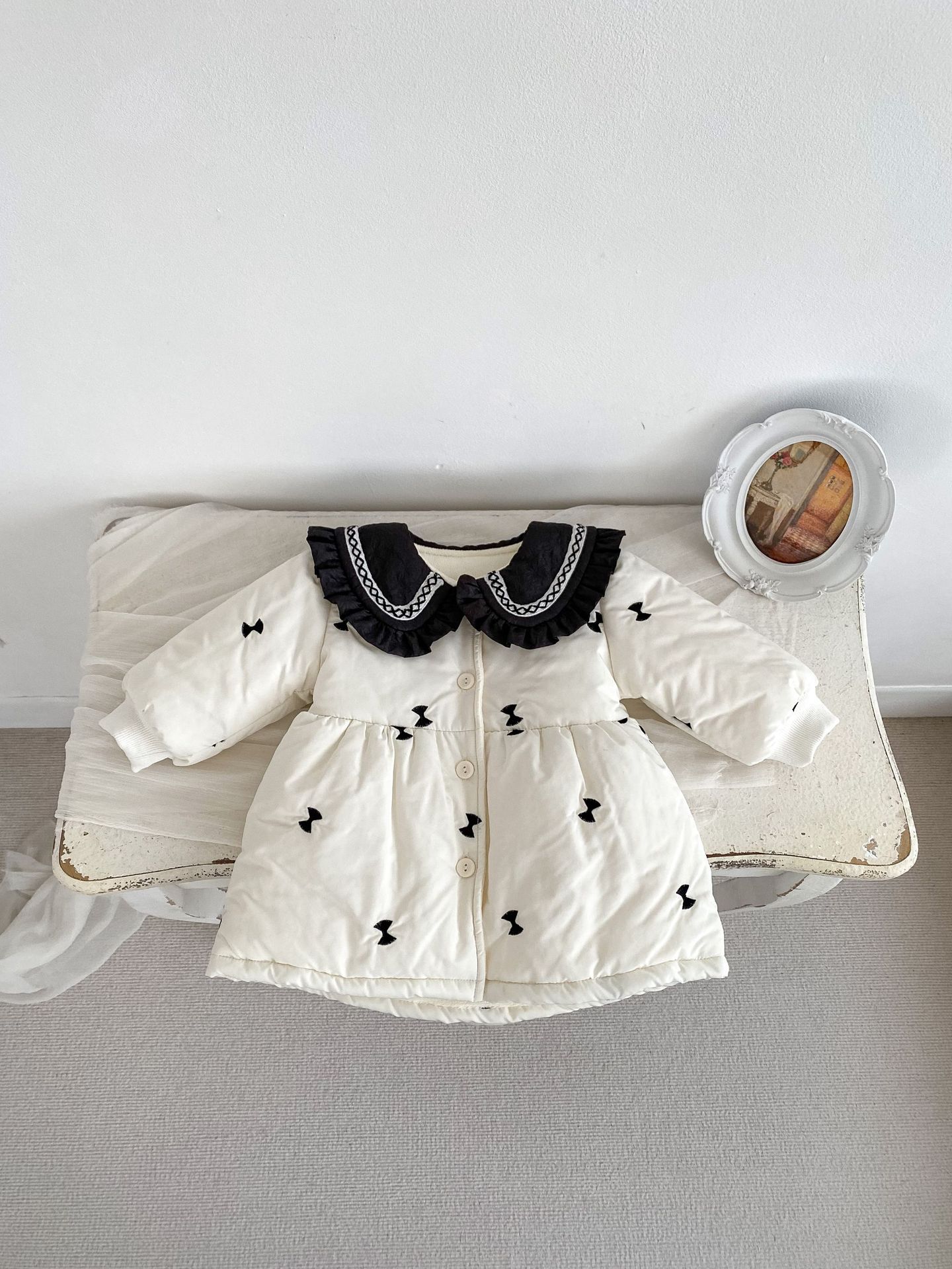 Picture of 2025 Baby Winter Clothes Cotton Clothes Girls Baby Long Thickened Cardigan Cotton Clothes Western Style Lace Lapel Padded Jacket