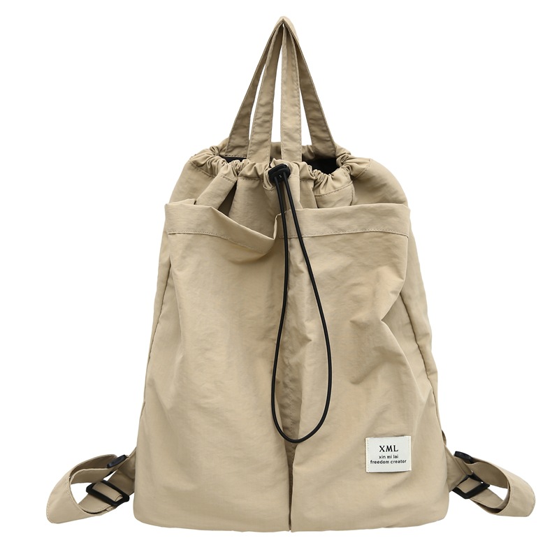 Picture of Large Capacity Solid Color Backpack Women's 2024 New Casual All-match Schoolbag Student Backpack Fashion Commuter Handbag