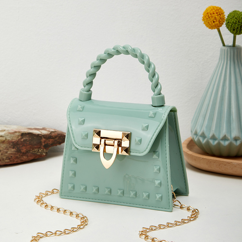 Picture of 2023 new fashion simple solid color rivet portable PVS mini jelly bag shoulder slung mouth red envelope wholesale