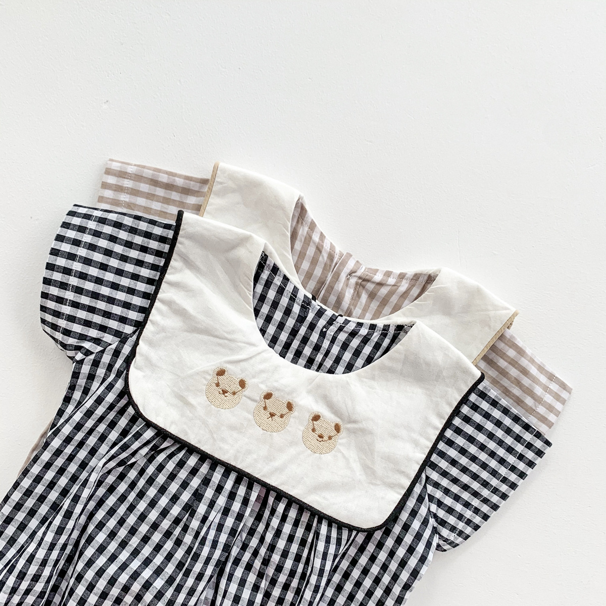 Picture of Korean Baby Jumpsuit Plaid Preppy Style Lapel Embroidered Bear Bag Fart Clothing Newborn Short-Sleeved Full Moon Outing Clothing