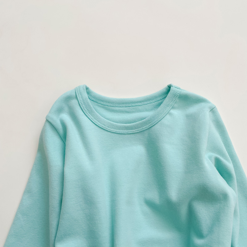 Picture of 2023 Children's Cotton Long-sleeved T-shirt Base Shirt Spring and Autumn Loose Solid Color Round Neck Sanding Top for Boys and Girls
