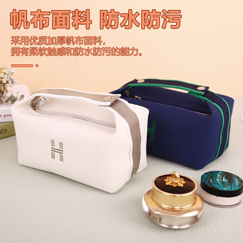 Picture of Portable Waterproof Canvas Cosmetic Bag High-value Large-capacity Toiletry Bag Cosmetics Internet Celebrity Portable Solid Color Storage Bag