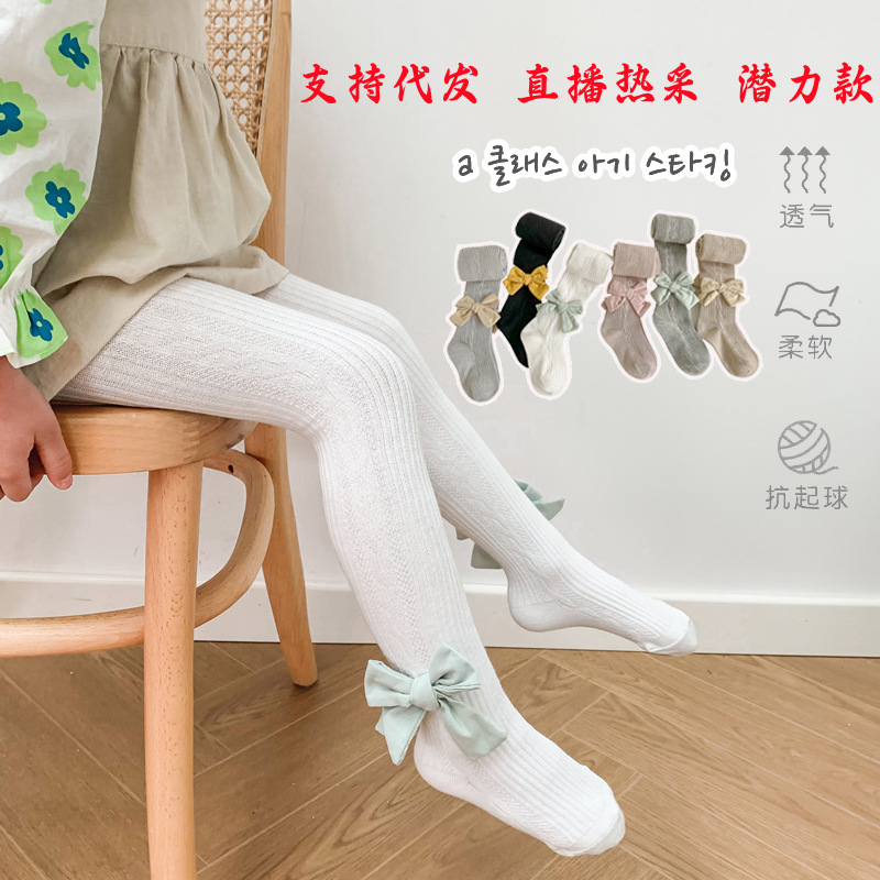 Children's pantyhose girls spring and autumn baby bottomings solid color bow socks baby leggings wholesale