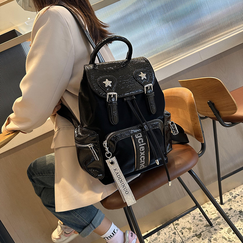 Picture of Western Internet Celebrity Backpack Women's 2025 New Soft Leather Casual Versatile Fashion Backpack Large Capacity Drawstring Travel Bag