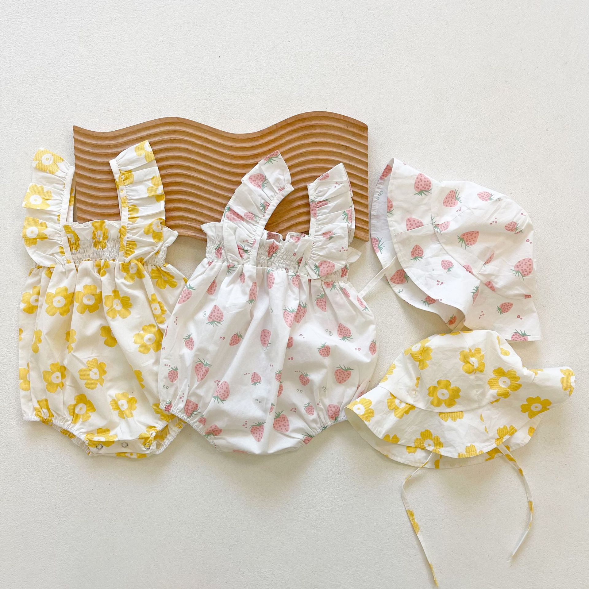 Picture of Ins2025 Baby Girl Summer Baby Jumpsuit Small Fresh Sling Bag Fart Clothing Outing Triangle Crawl Suit