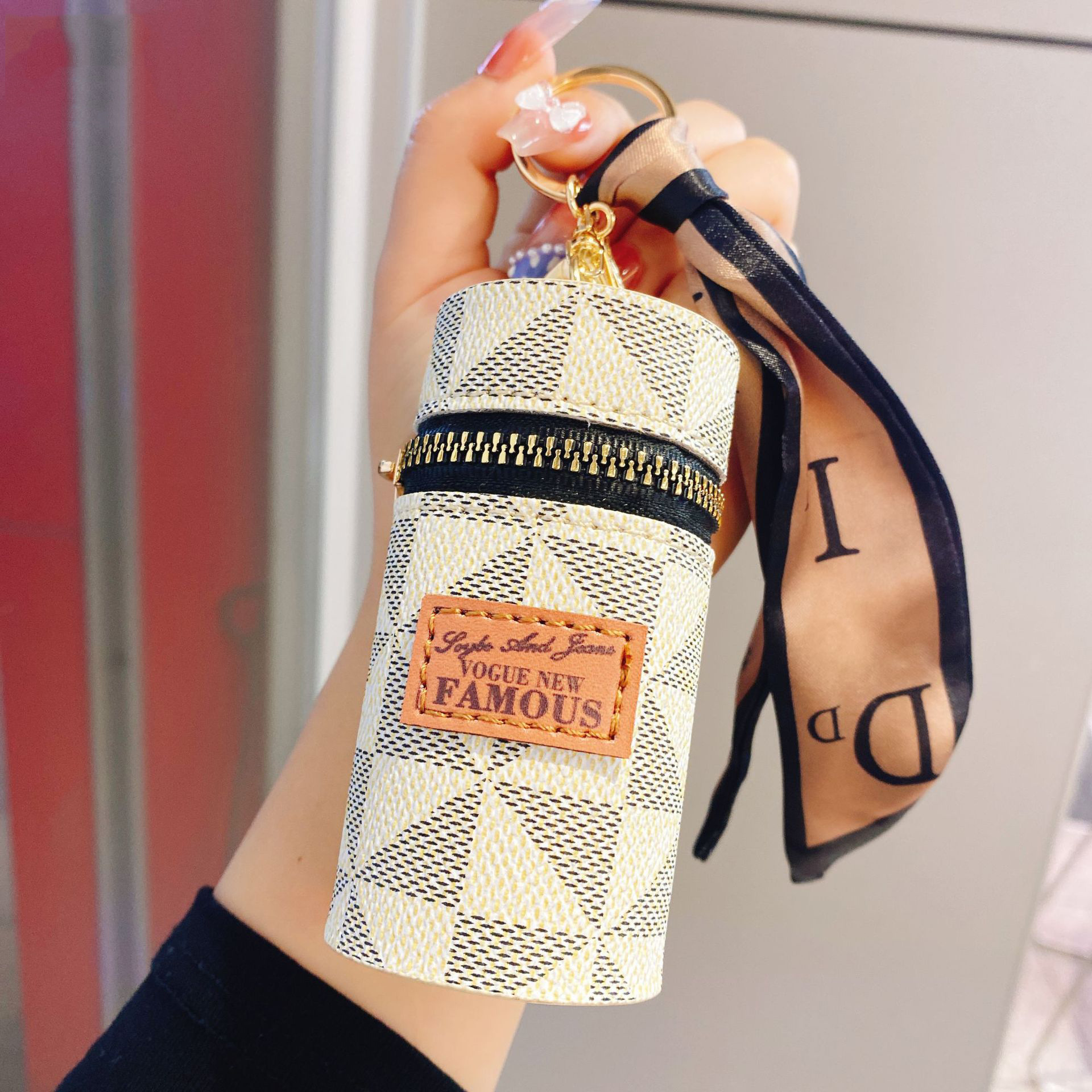 Picture of Bags for Women 2025 New Retro Presbyopia Leather Keychain Leather Mini Lipstick Bag Qiao Headphones Coin Pendant Bag