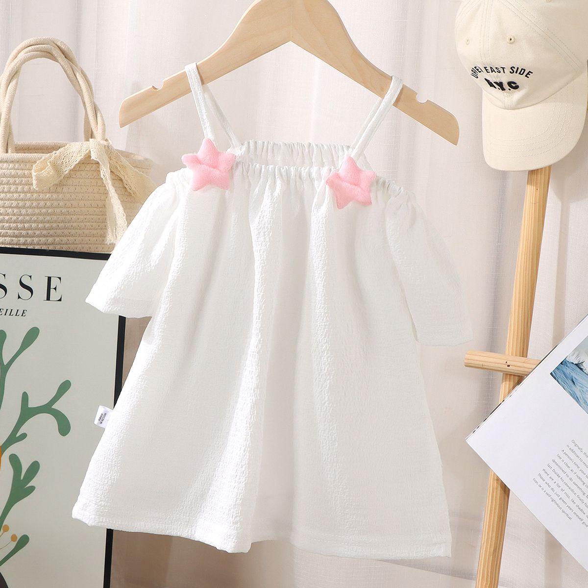 Picture of Girls' short-sleeved T-shirt 2024 new summer baby girls' off-shoulder strap fashionable western style top for infants and children