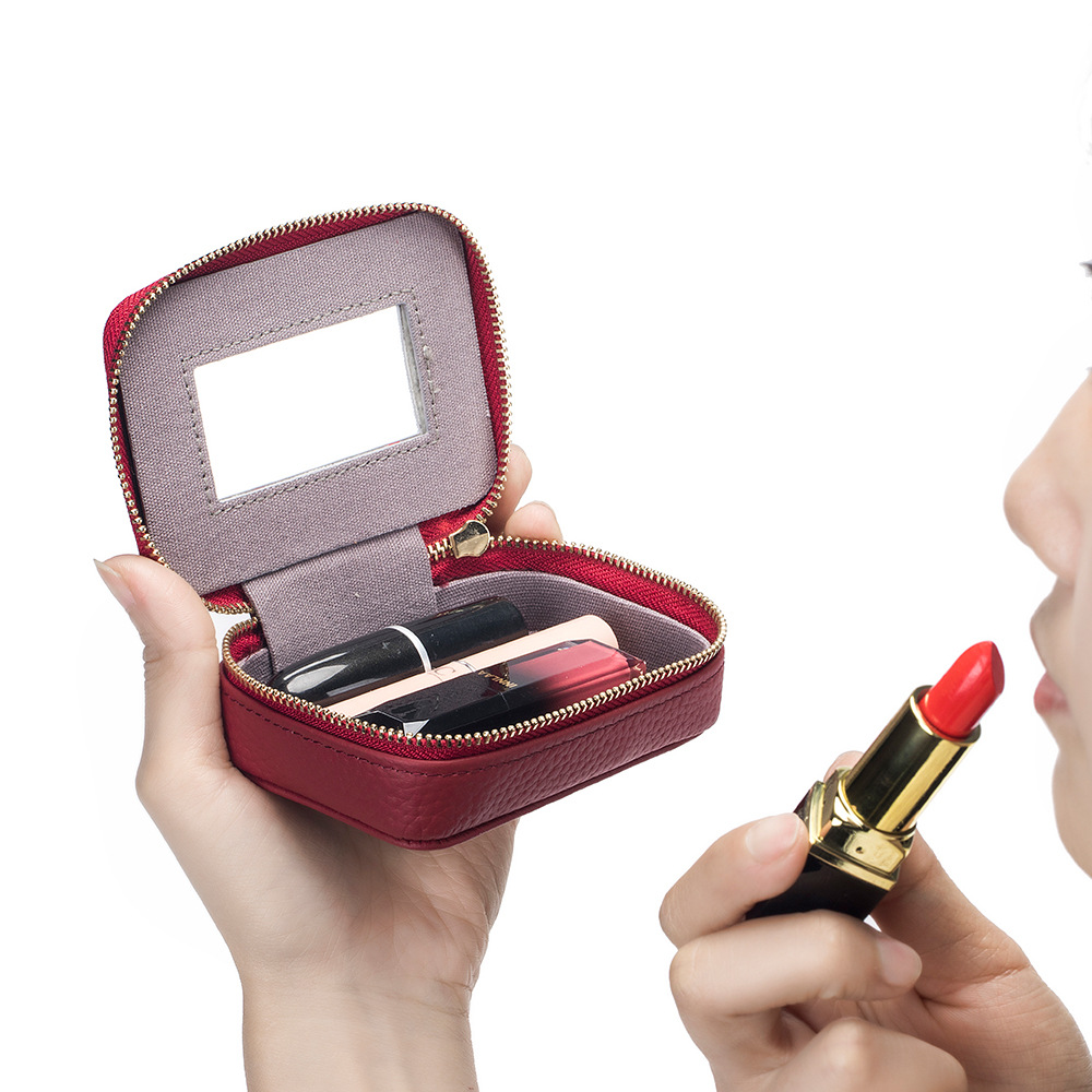 Picture of 2024 Genuine Leather Mini Portable Lipstick Bag with Mirror First Layer Cowhide Storage Bag Coin Coin Headphone Bag for Women