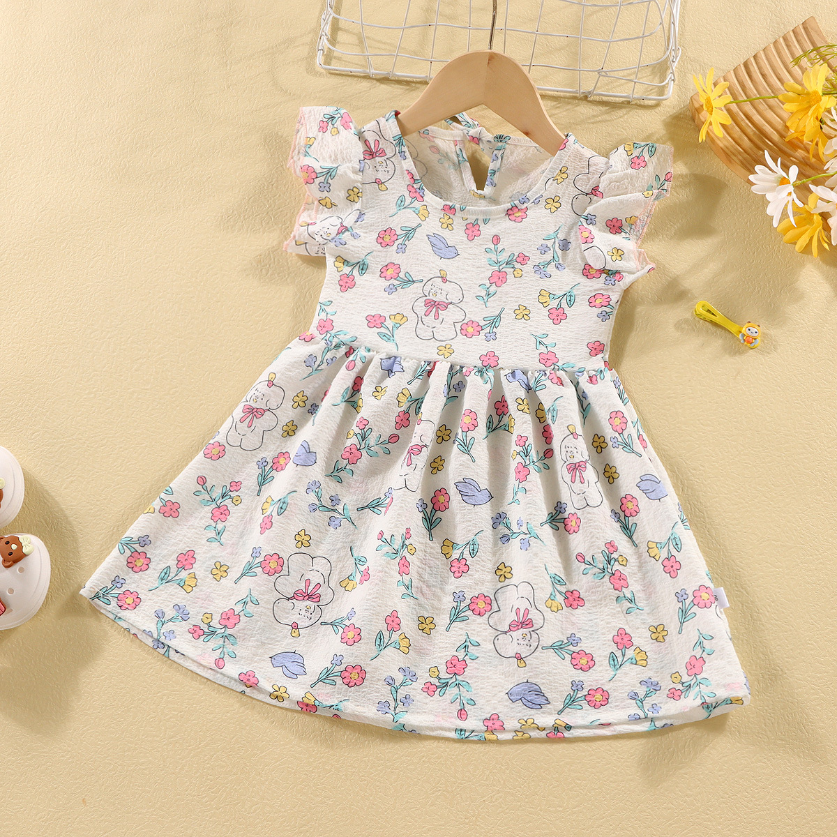 Picture of Girls' short-sleeved T-shirt 2024 new summer baby girls' off-shoulder strap fashionable western style top for infants and children