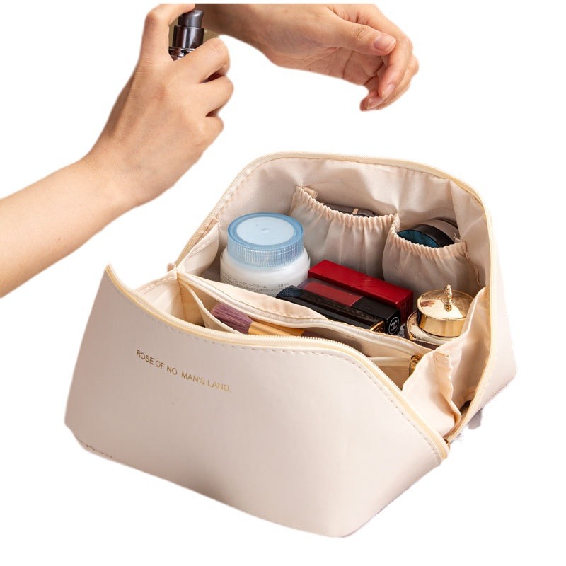 Picture of Ins Portable Large Capacity PU Portable Toiletry Bag Travel Partition Storage Bag Organ Pillow Cosmetic Bag Wholesale