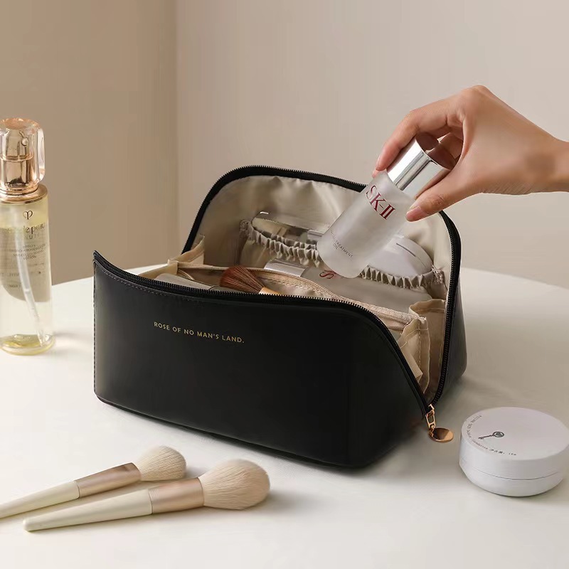 Picture of 2024 New Large Capacity Internet Celebrity Organ Pillow Cosmetic Bag Portable Outing Storage Toiletries Bag Fashionable