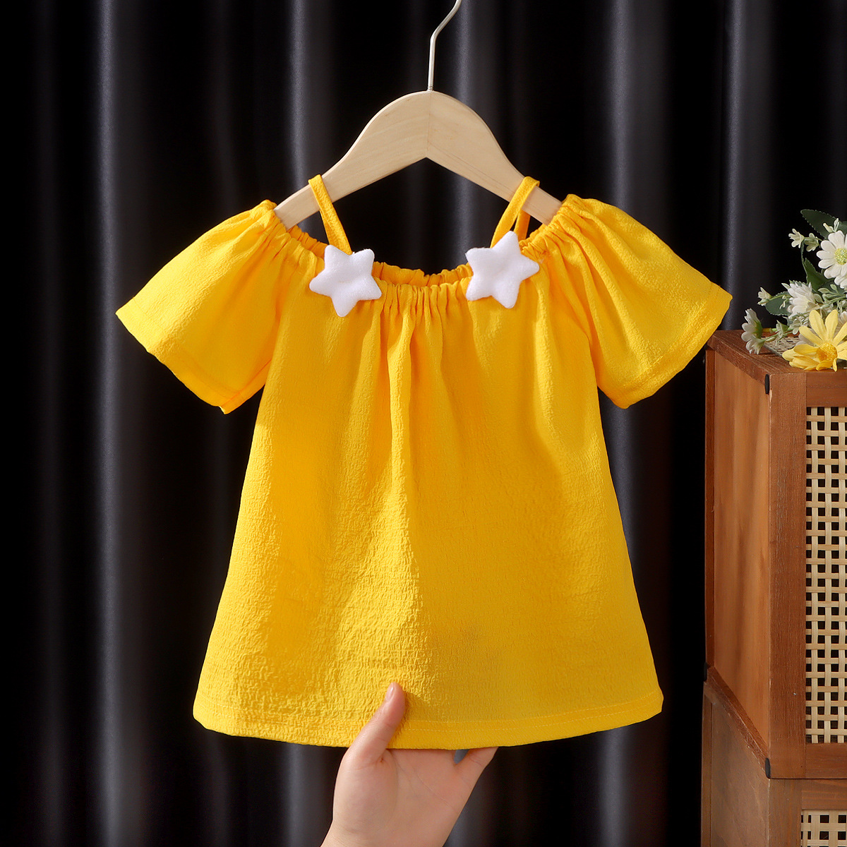Picture of Girls' short-sleeved T-shirt 2024 new summer baby girls' off-shoulder strap fashionable western style top for infants and children