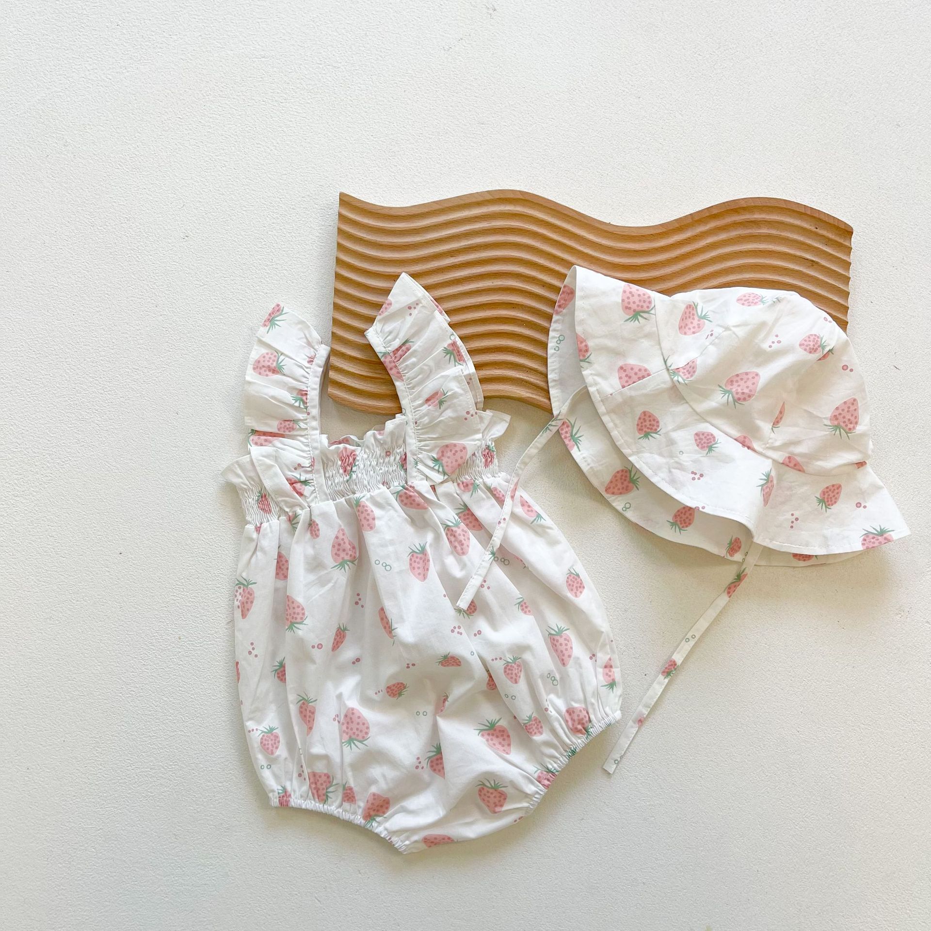 Picture of Ins2025 Baby Girl Summer Baby Jumpsuit Small Fresh Sling Bag Fart Clothing Outing Triangle Crawl Suit