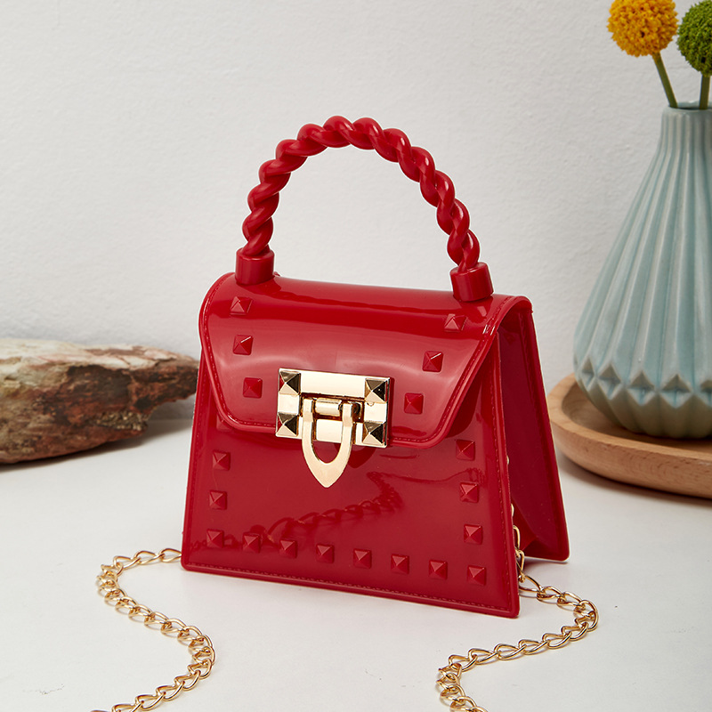 Picture of 2023 new fashion simple solid color rivet portable PVS mini jelly bag shoulder slung mouth red envelope wholesale