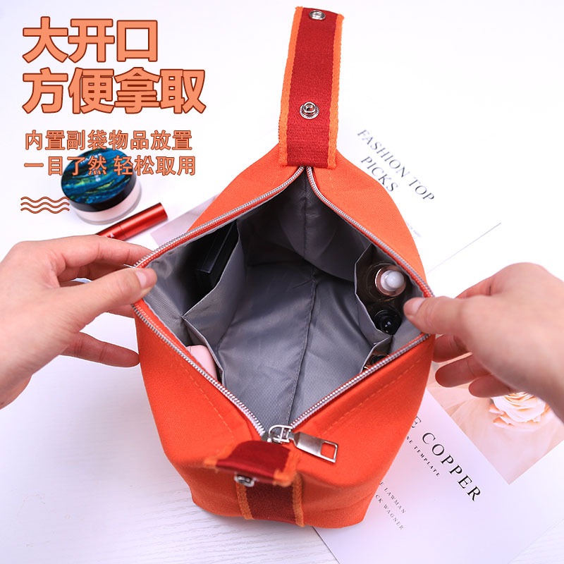 Picture of Portable Waterproof Canvas Cosmetic Bag High-value Large-capacity Toiletry Bag Cosmetics Internet Celebrity Portable Solid Color Storage Bag