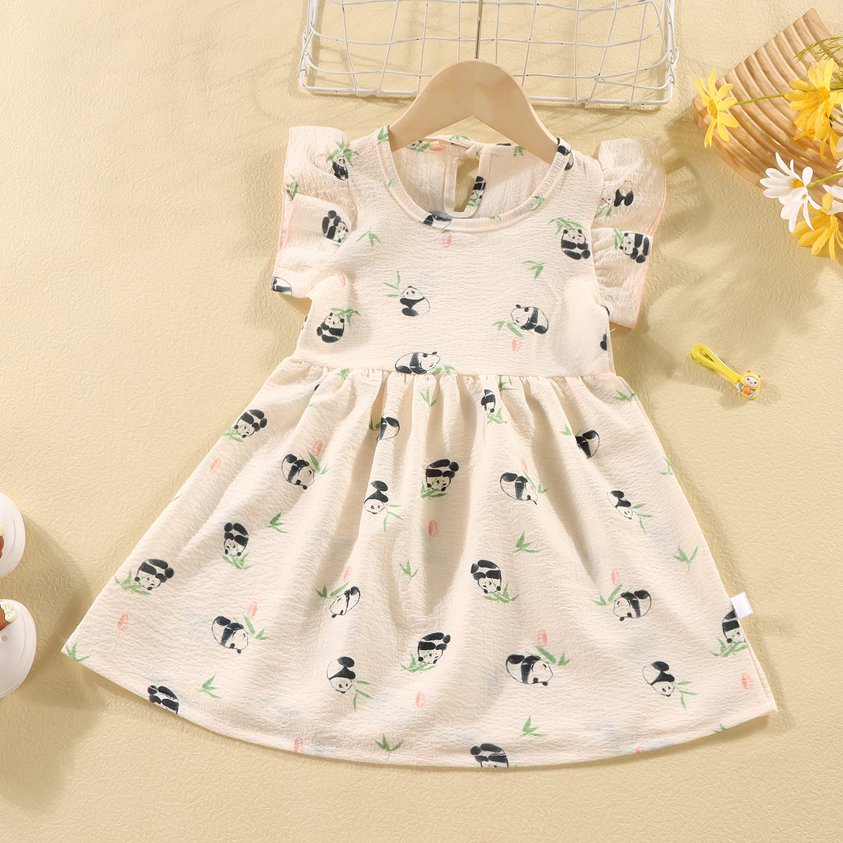 Picture of Girls' short-sleeved T-shirt 2024 new summer baby girls' off-shoulder strap fashionable western style top for infants and children
