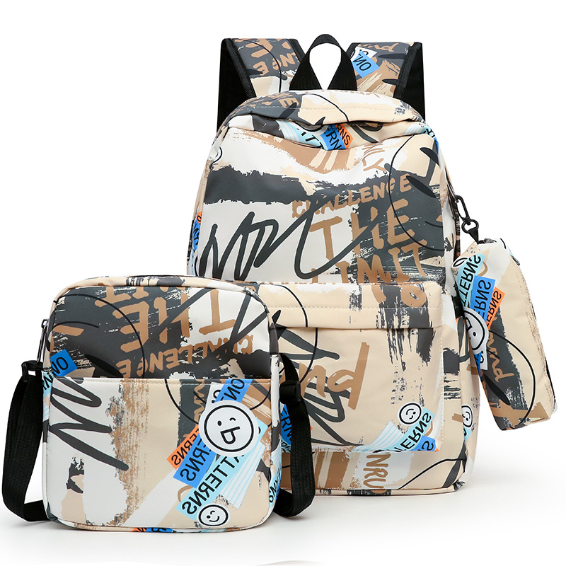 Factory wholesale new three-piece backpack schoolbag for primary and secondary school students Korean fashion simple large capacity anti-splashing shoulder bag