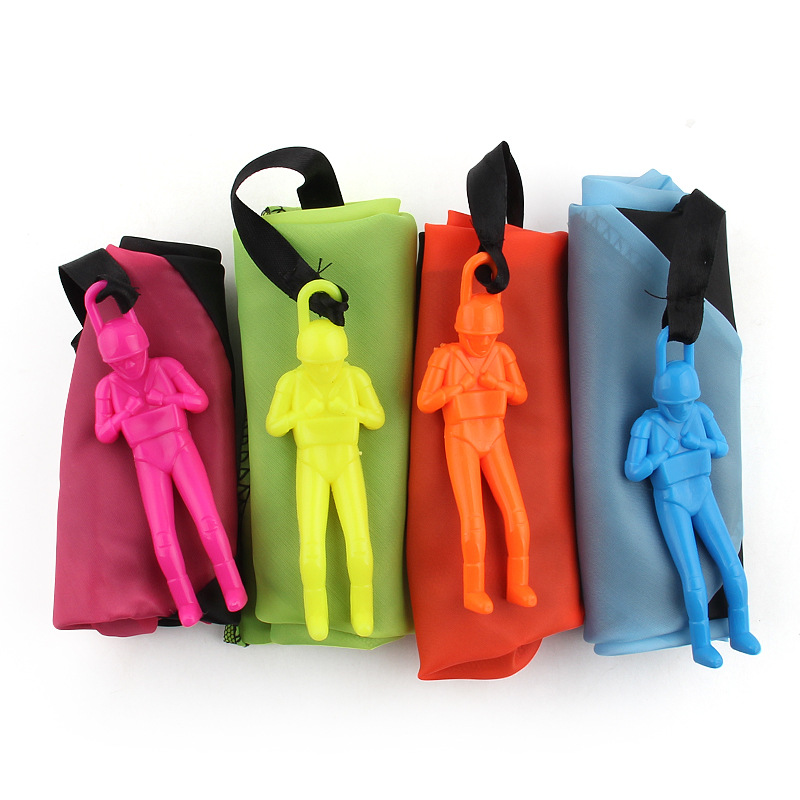 Picture of Children Hand Throwing Parachute Soldier Small Flying Umbrella Outdoor Leisure Sports Toy Square Park Hot Selling Bag