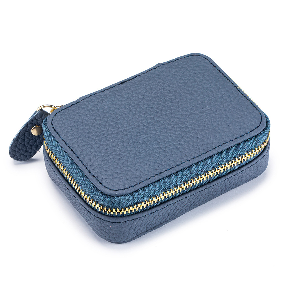 Picture of 2024 Genuine Leather Mini Portable Lipstick Bag with Mirror First Layer Cowhide Storage Bag Coin Coin Headphone Bag for Women