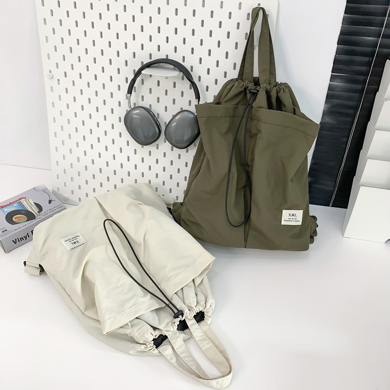 Picture of Large Capacity Solid Color Backpack Women's 2024 New Casual All-match Schoolbag Student Backpack Fashion Commuter Handbag