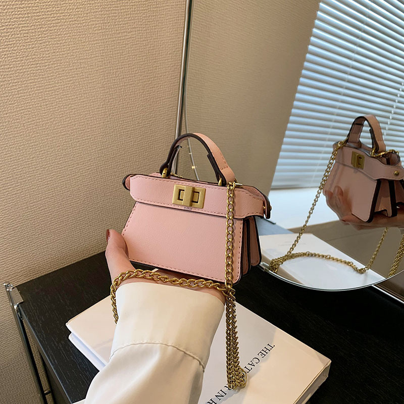 Picture of 2023 new cross-border small popular online catwalk with double-sided lock portable diagonal chain lipstick bag