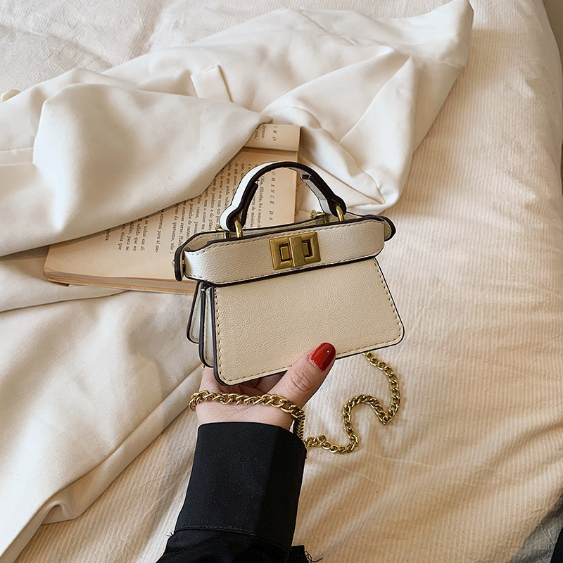 Picture of 2023 new cross-border small popular online catwalk with double-sided lock portable diagonal chain lipstick bag
