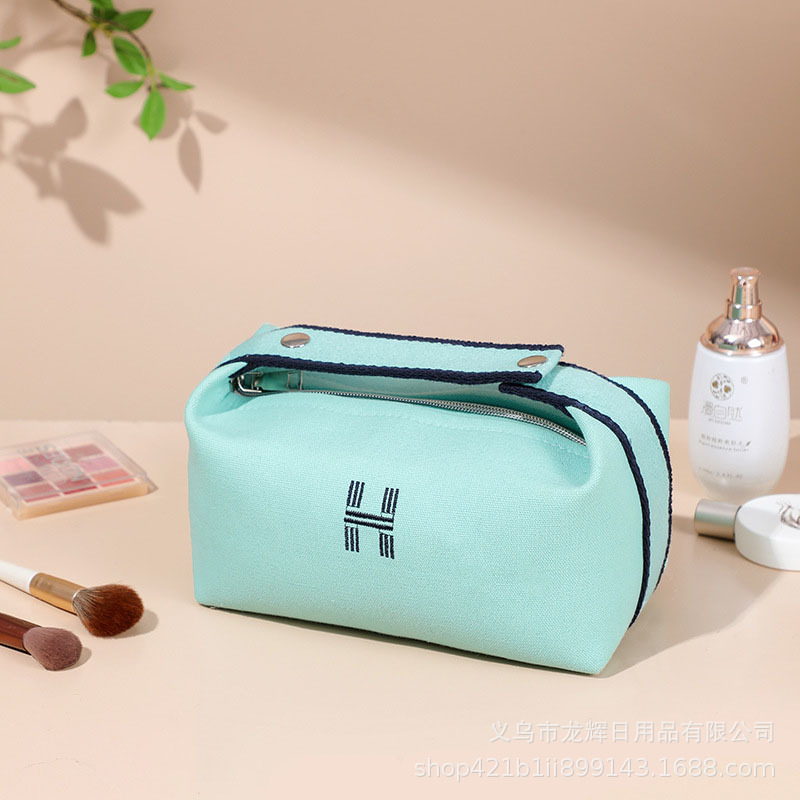 Picture of Portable Waterproof Canvas Cosmetic Bag High-value Large-capacity Toiletry Bag Cosmetics Internet Celebrity Portable Solid Color Storage Bag