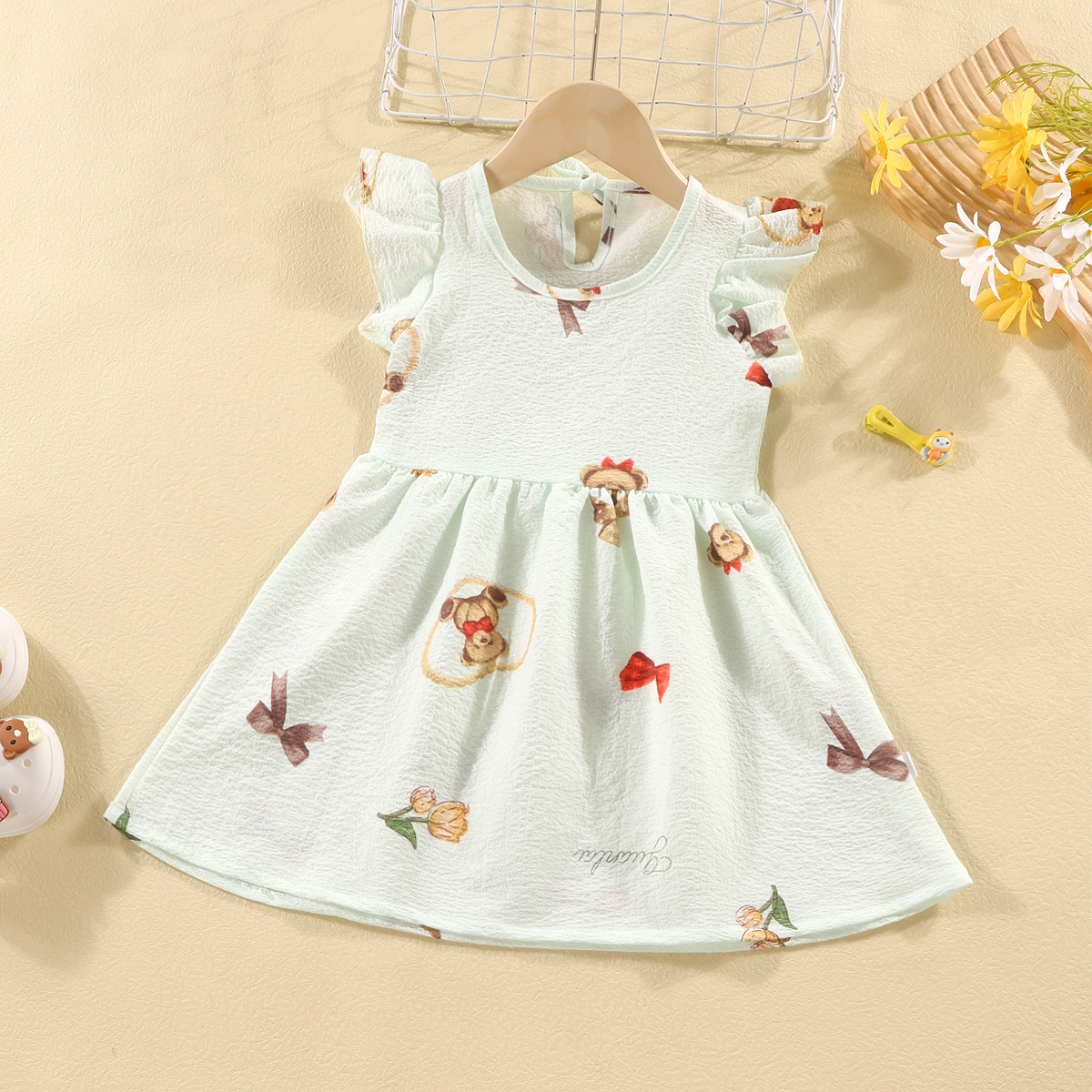 Picture of Girls' short-sleeved T-shirt 2024 new summer baby girls' off-shoulder strap fashionable western style top for infants and children