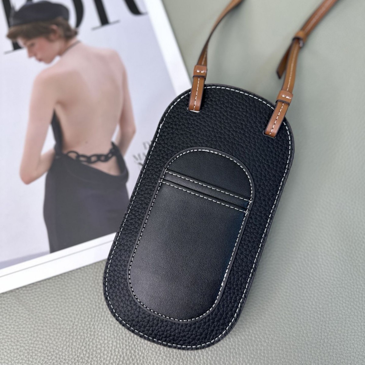 Picture of Cowhide Hollow Mobile Phone Bag for Women 2024 New Fashion Super Hot Shoulder Crossbody Bag Niche Design Western Style Large Capacity