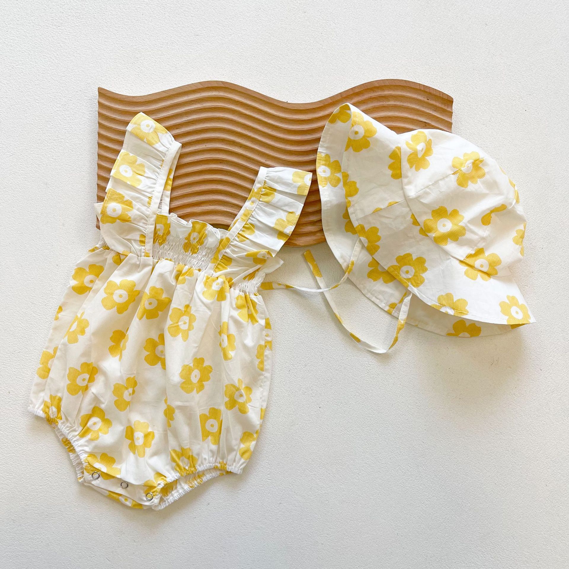 Picture of Ins2025 Baby Girl Summer Baby Jumpsuit Small Fresh Sling Bag Fart Clothing Outing Triangle Crawl Suit
