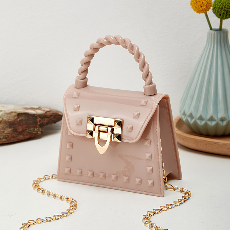 Picture of 2023 new fashion simple solid color rivet portable PVS mini jelly bag shoulder slung mouth red envelope wholesale