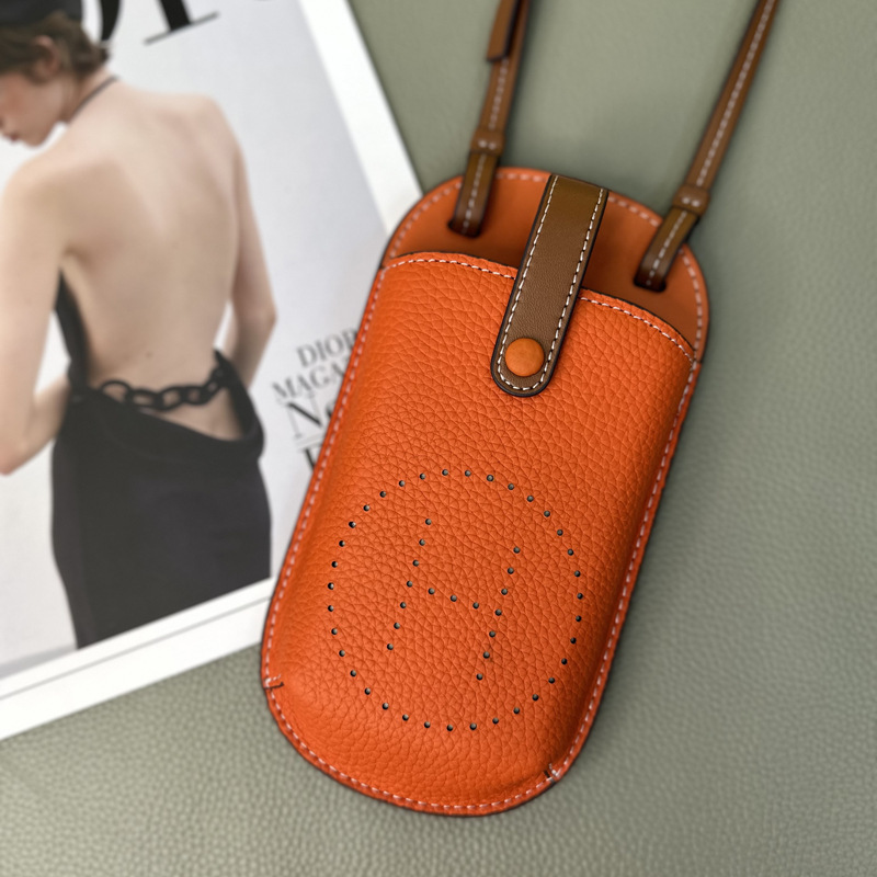 Picture of Cowhide Hollow Mobile Phone Bag for Women 2024 New Fashion Super Hot Shoulder Crossbody Bag Niche Design Western Style Large Capacity
