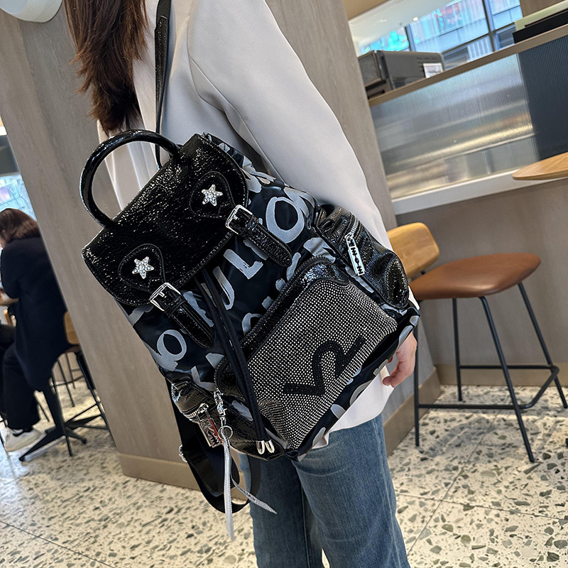 Picture of High-End Letter Hot Diamond Backpack for Women 2025 New Fashion Versatile Foreign Style Large Capacity Backpack Summer Travel