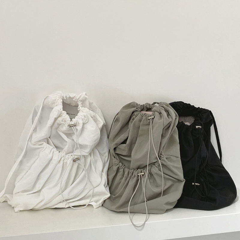 Picture of South Korea casual nylon large capacity student backpack simple Joker drawstring solid color canvas backpack wholesale